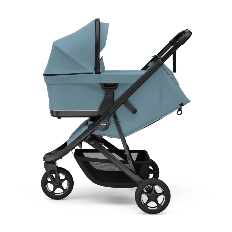Thule Spring 2 stroller Mid Blue on Black, folded and self-standing