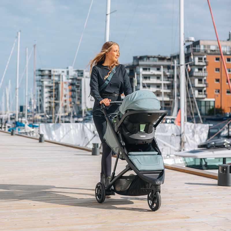 Thule Spring 2 with bassinet attached, walking by the harbour