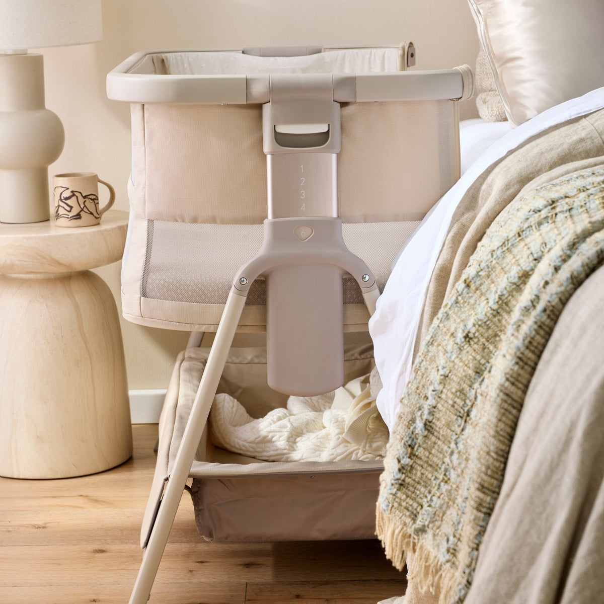 CoZee Breeze Zen attached beside the bed, end view showing the storage tray
