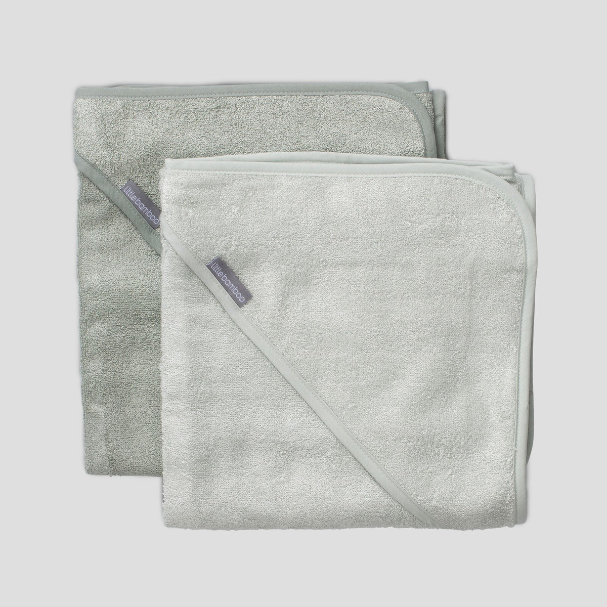Baby wrapped in a Little Bamboo Turtle Bay hooded towel