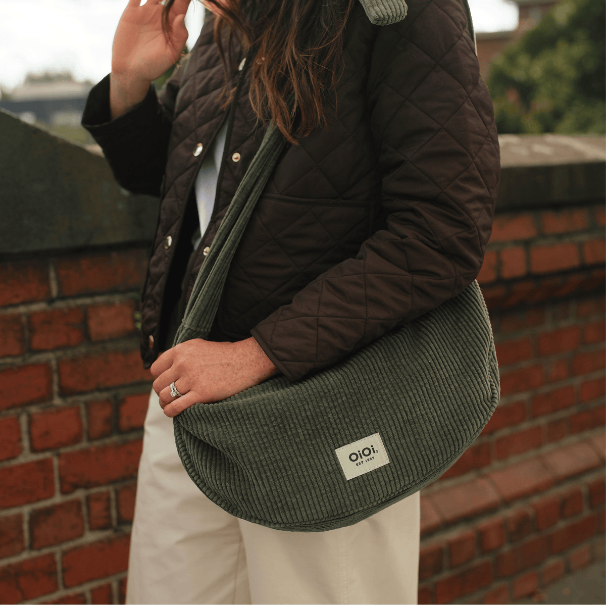 OiOi Luna Crossbody interior pockets and gingham lining (shown in Moss Green)