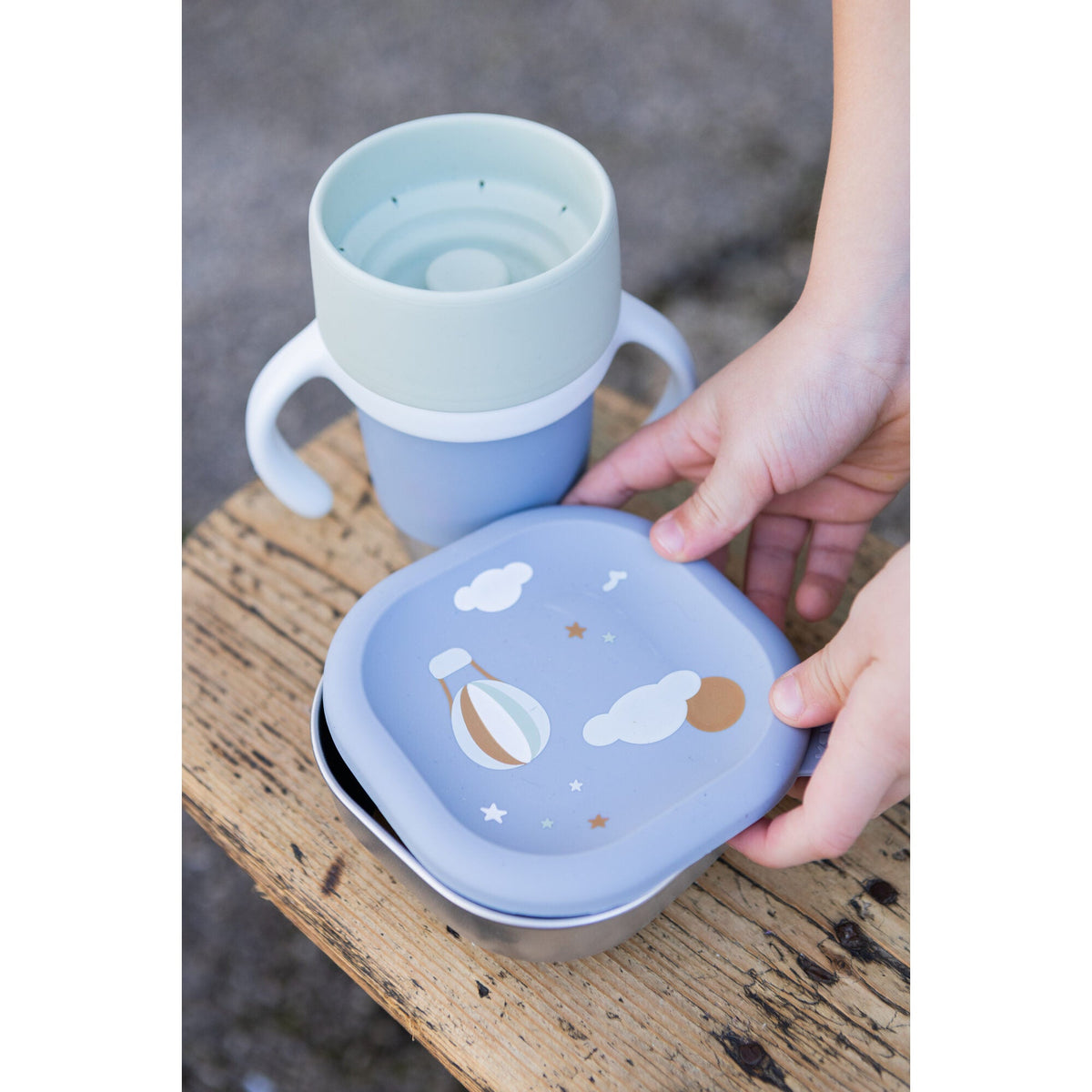 Toddler drinking from the Beaba Click & Drink 360 cup