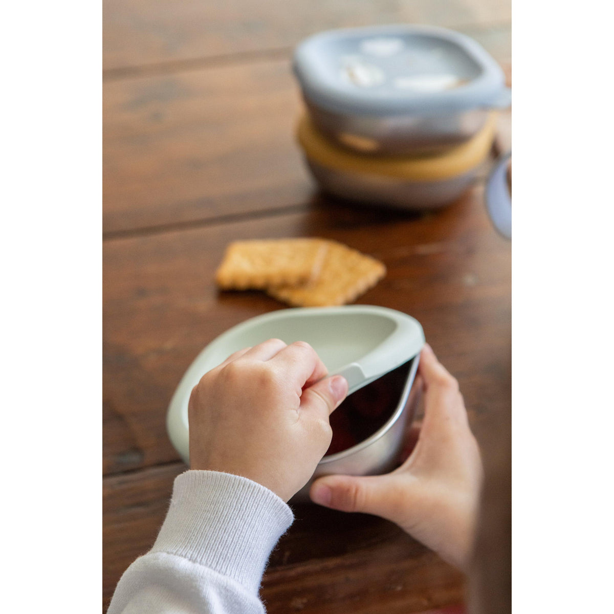 Beaba stainless steel baby food storage in use