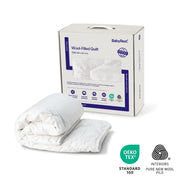 Babyrest Cot Quilt Wool Filled in retail packaging with certification icons