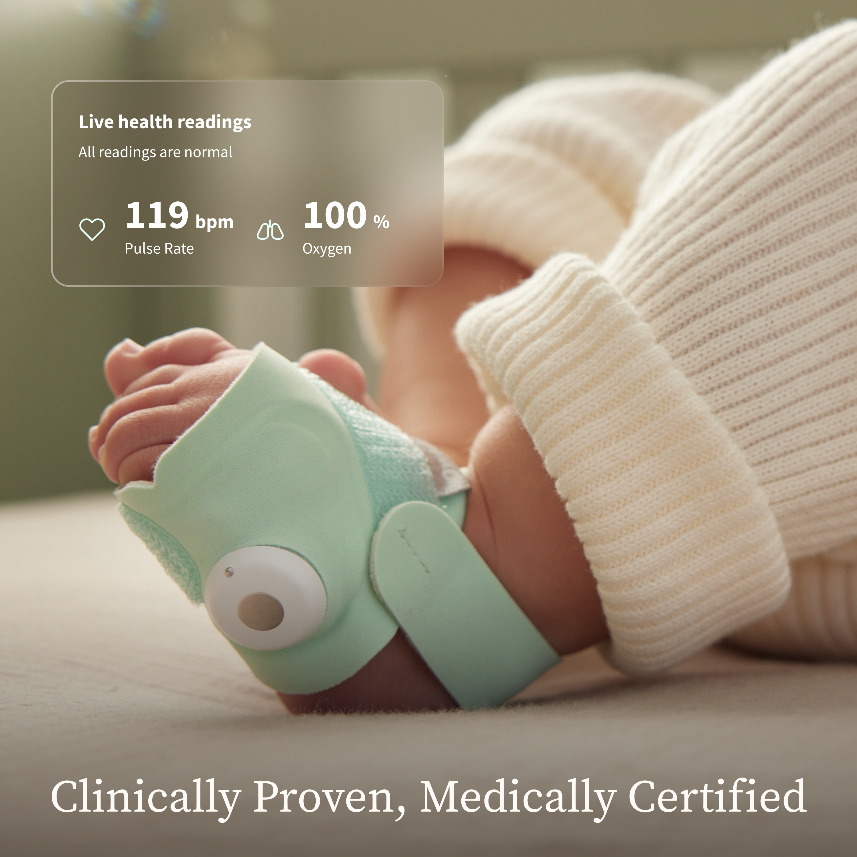 Dream Sock™ on baby's foot tracking pulse rate and oxygen
