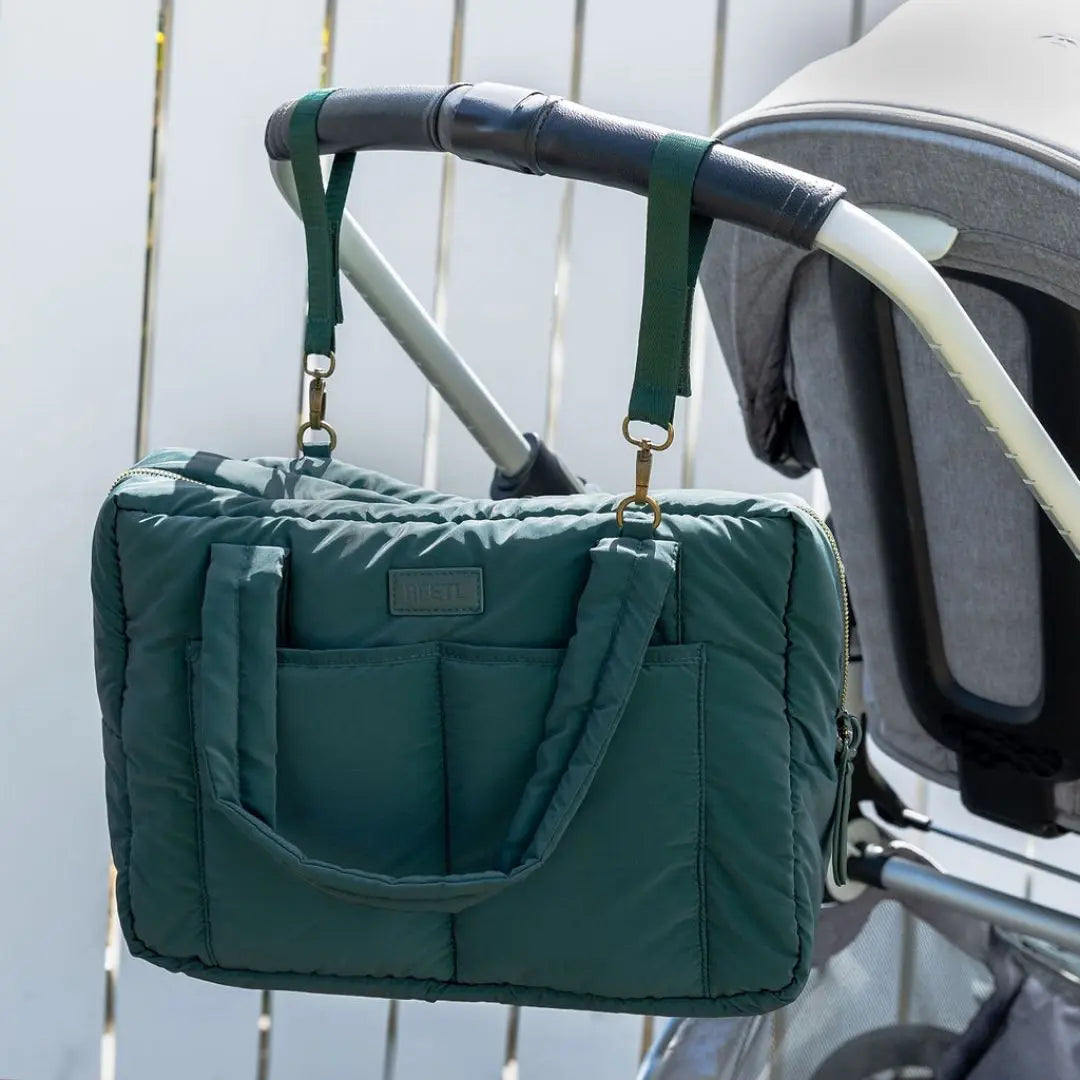 BEETL Baby Bag open showing interior compartments and bottle holders