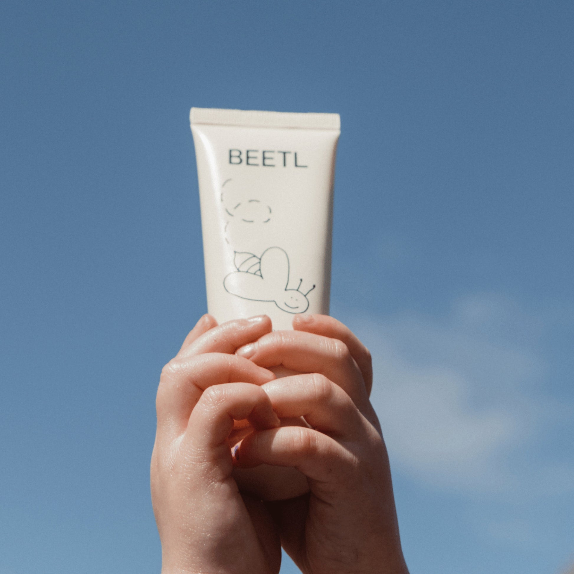 BEETL Baby Balm being applied to baby's nappy area