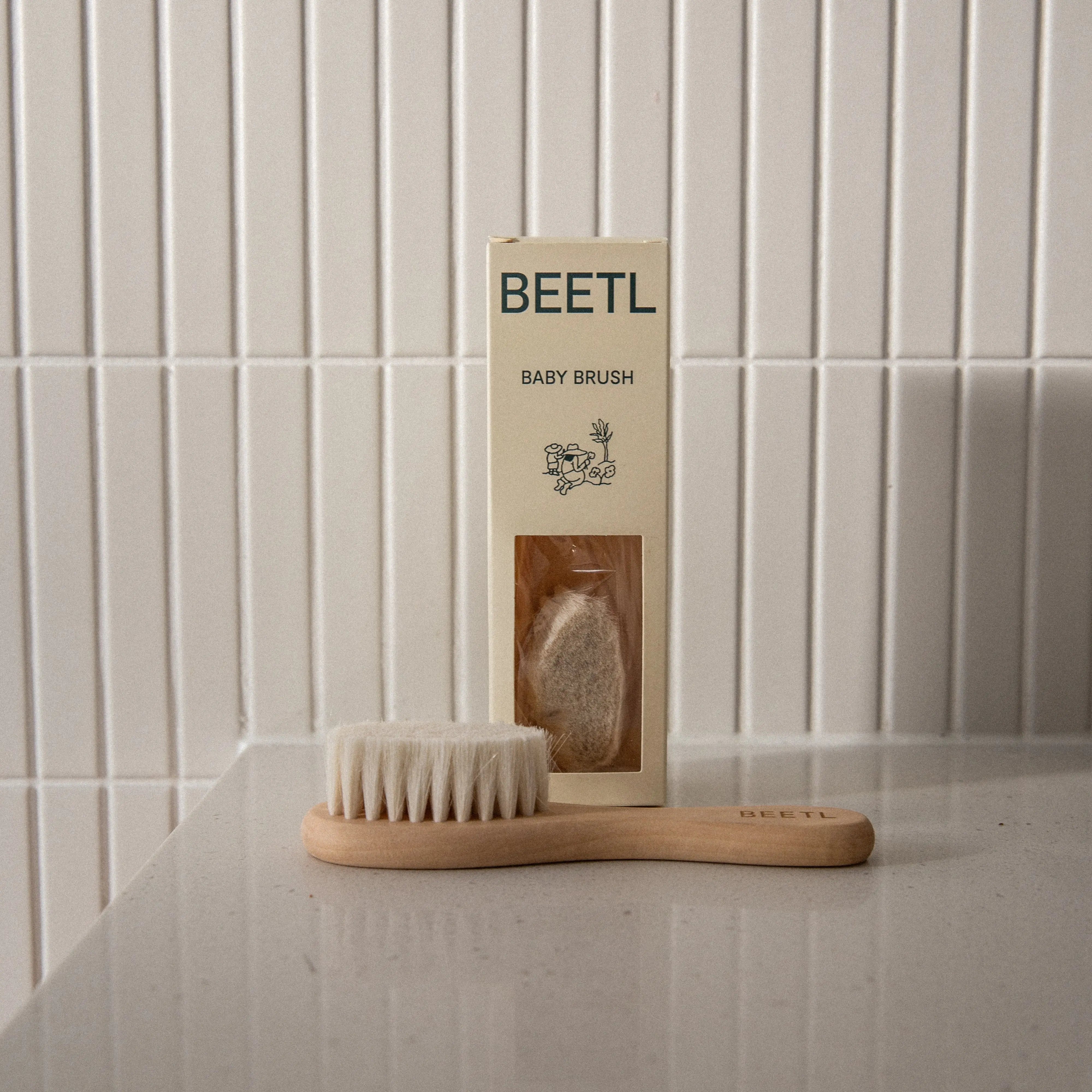 BEETL Baby Brush wooden handle and goat's wool bristles close-up