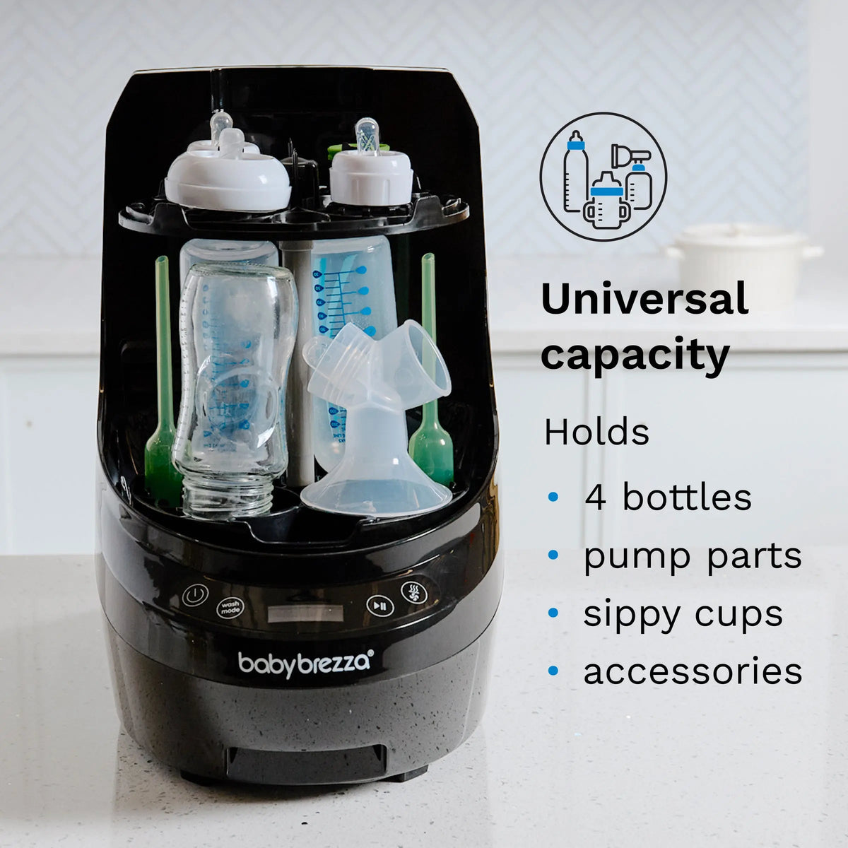 Baby Brezza Bottle Washer Pro in Black holding bottles, pump parts and sippy cups