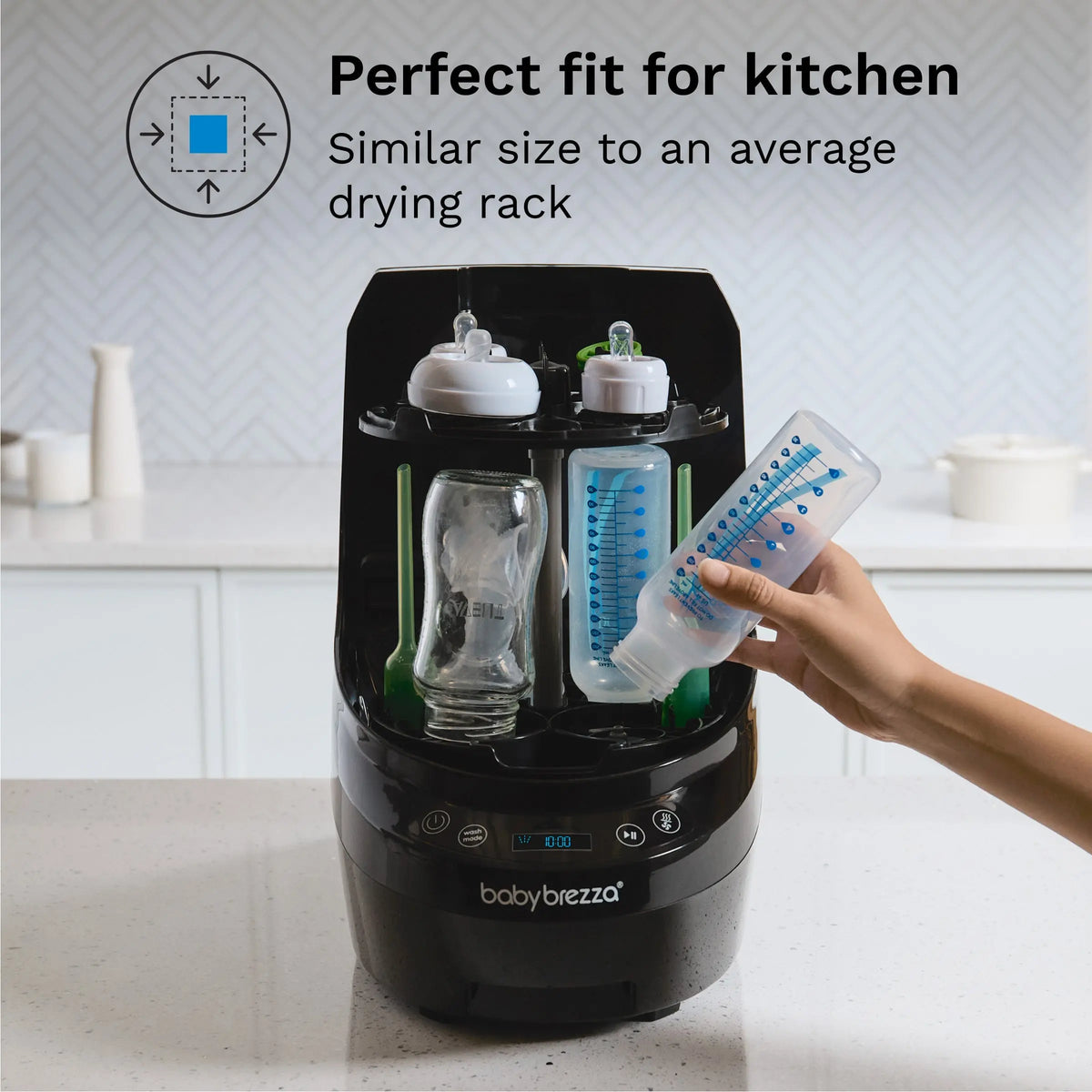 Baby Brezza Bottle Washer Pro in Black on a kitchen bench