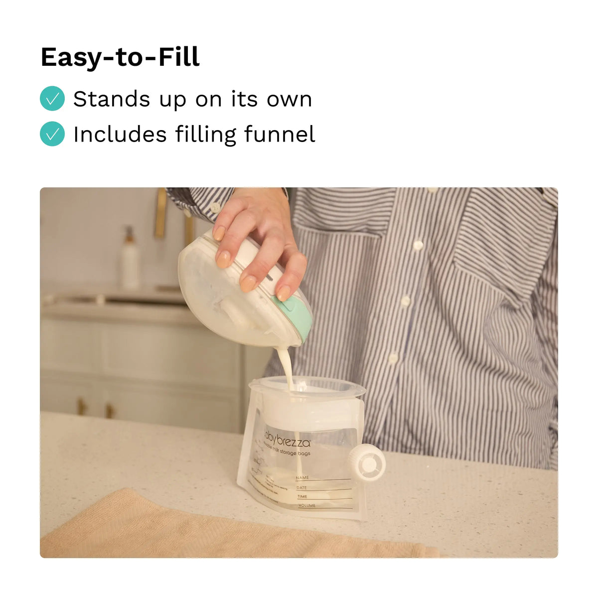 Filling a Baby Brezza breast milk bag using the funnel