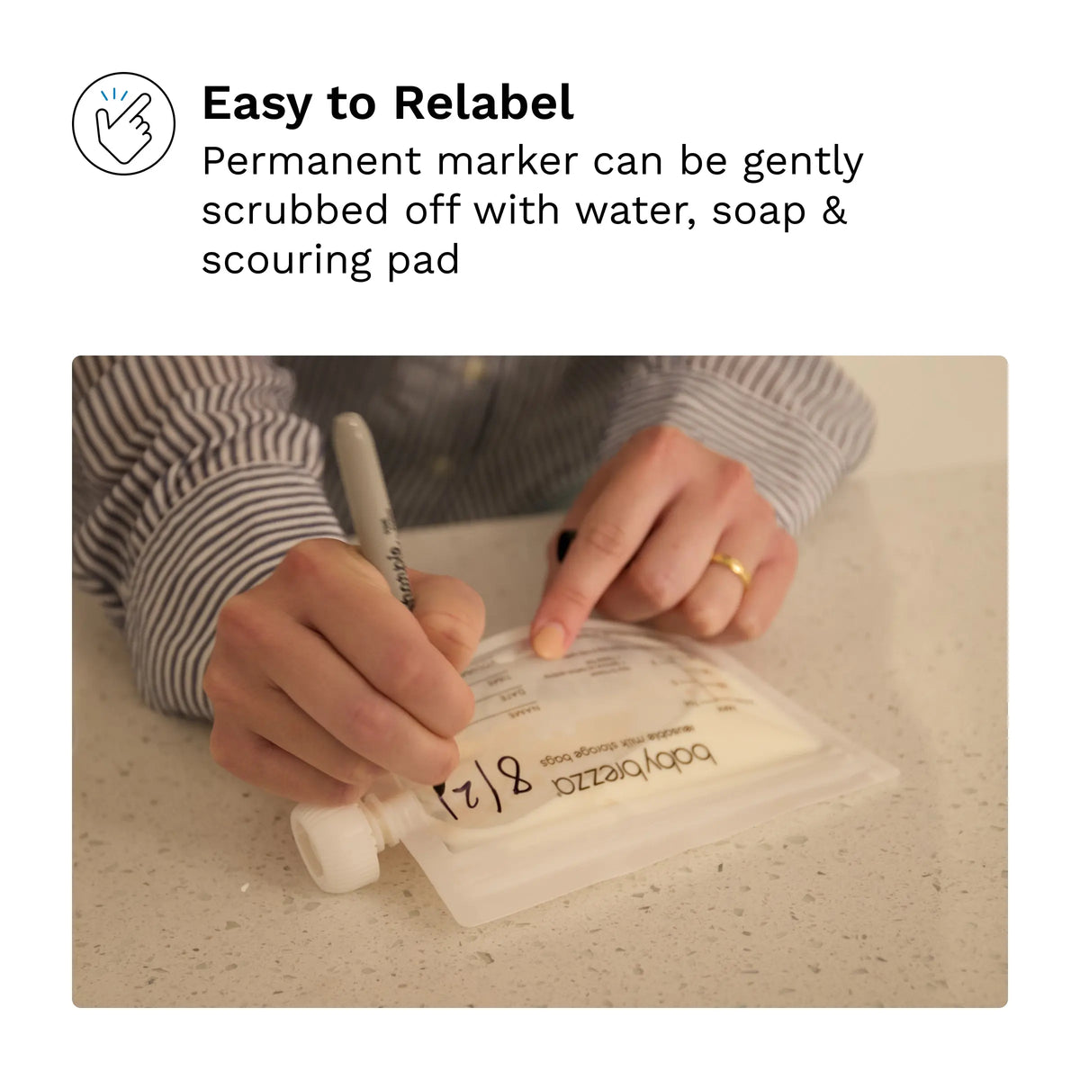 Labelling a Baby Brezza breast milk bag with a marker
