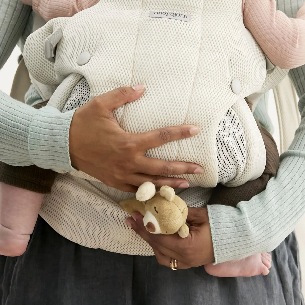 Close-up of the breathable Airy Mesh on the BabyBjorn Baby Carrier Hold Cream