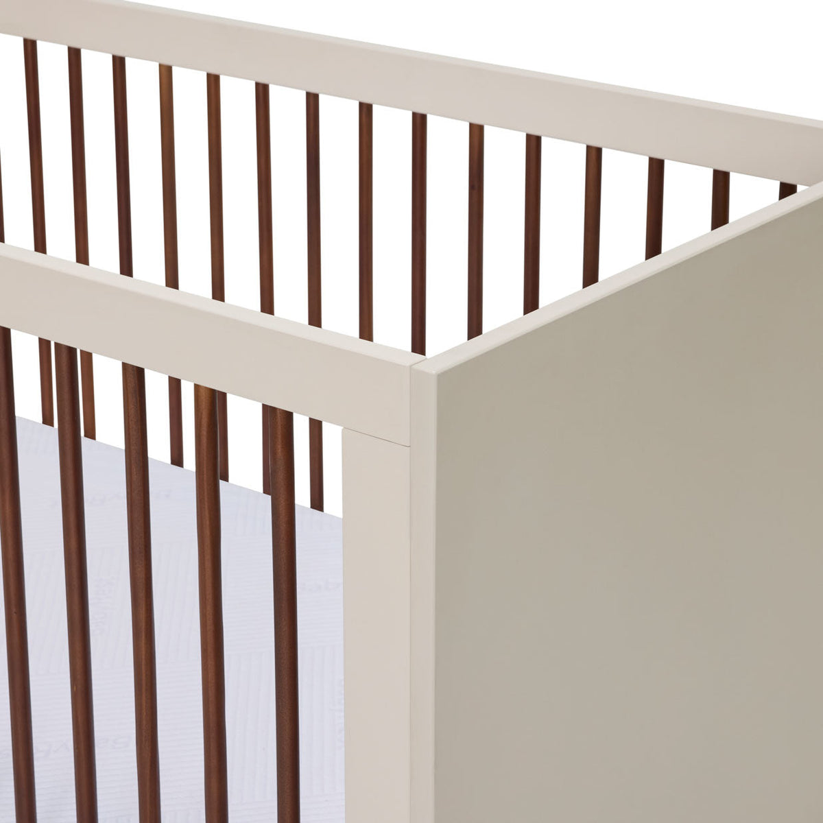 Babyrest Hugo Cot timber and cream panel detail