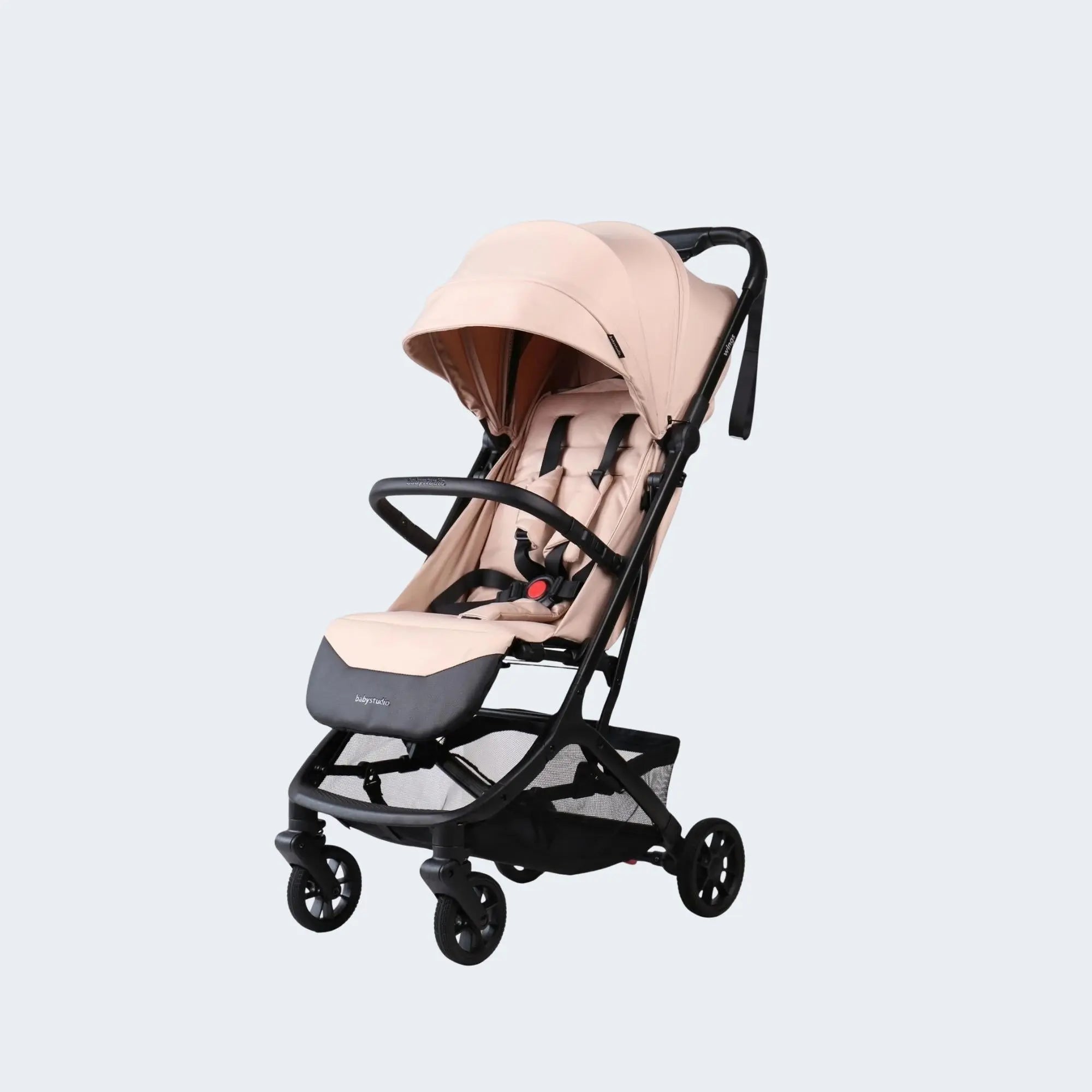 Babystudio Wings Travel Stroller — lockable front swivel wheels and all-wheel suspension