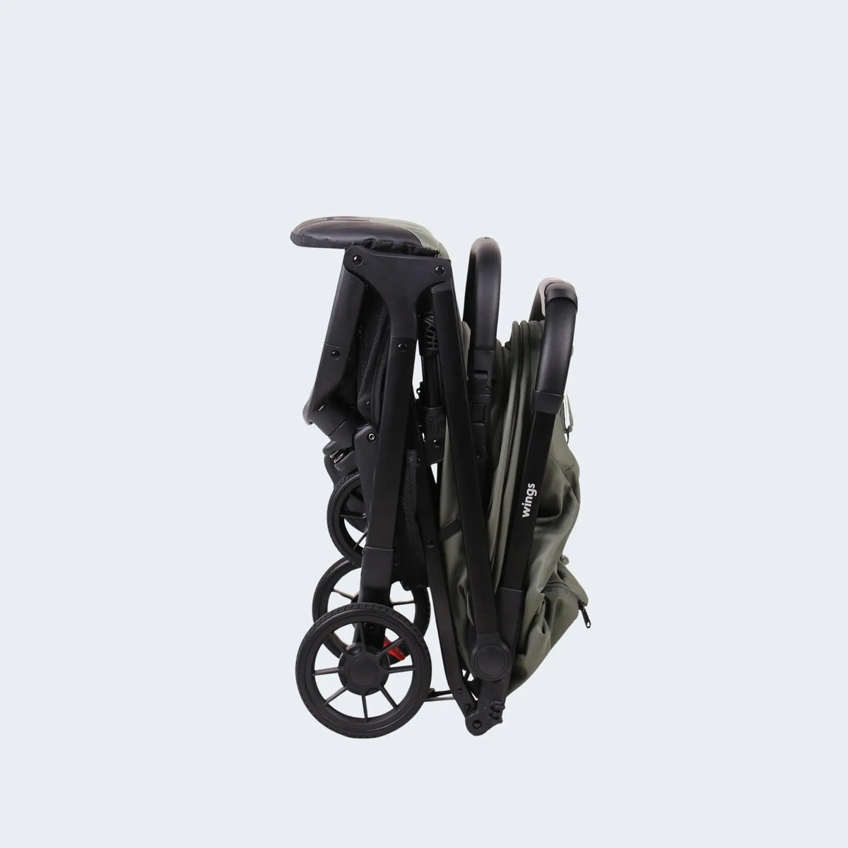 Babystudio Wings Travel Stroller — 5-point adjustable safety harness closeup
