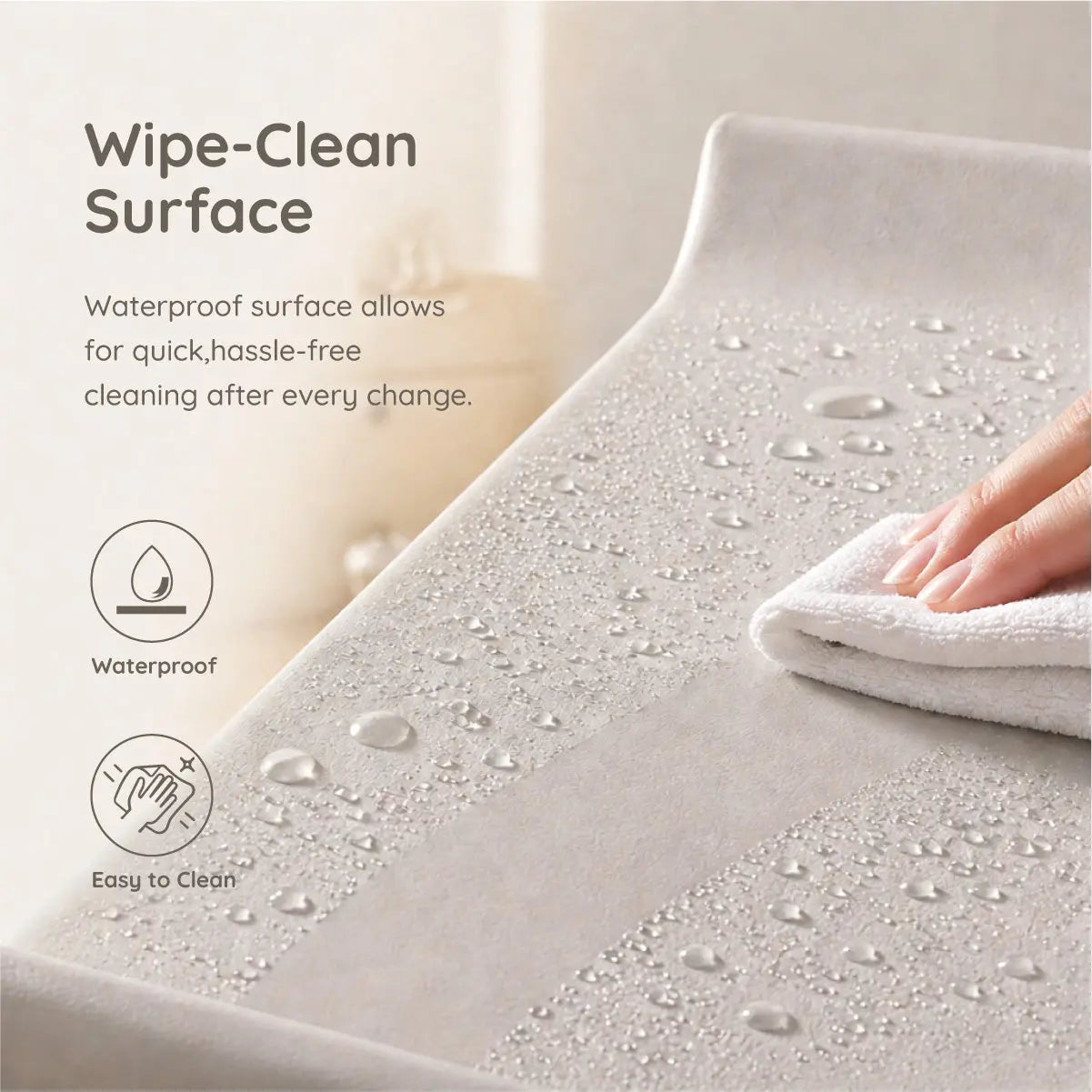 Close-up of Boori Soft Lux Change Pad waterproof PU leather surface in grey