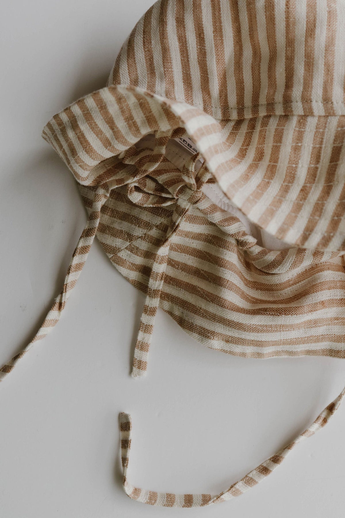 Mumma Etcetera Burleigh linen baby hat with neck tie, hand-dyed in small batches