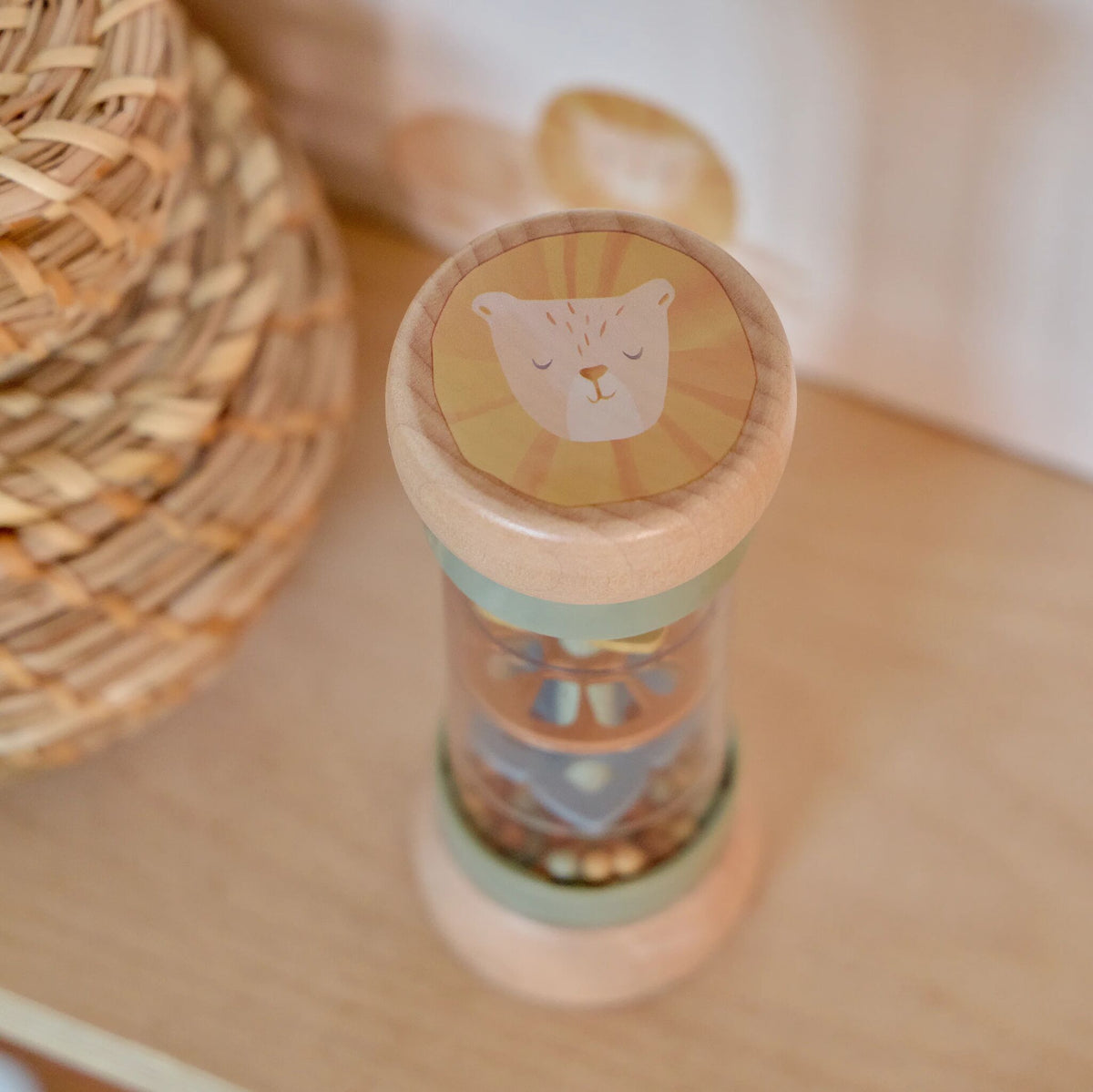Baby holding the Little Dutch rain rattle