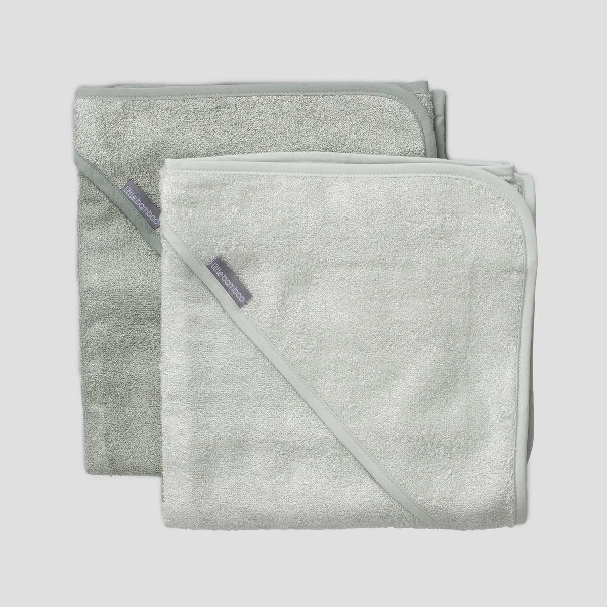 Baby wrapped in a Little Bamboo Turtle Bay hooded towel
