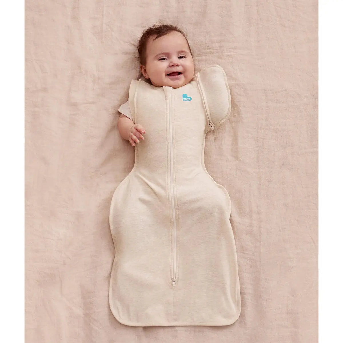 Love to Dream 2-in-1 Early Roller Transition Bag 1.0 TOG Oatmeal — full swaddle both wings on