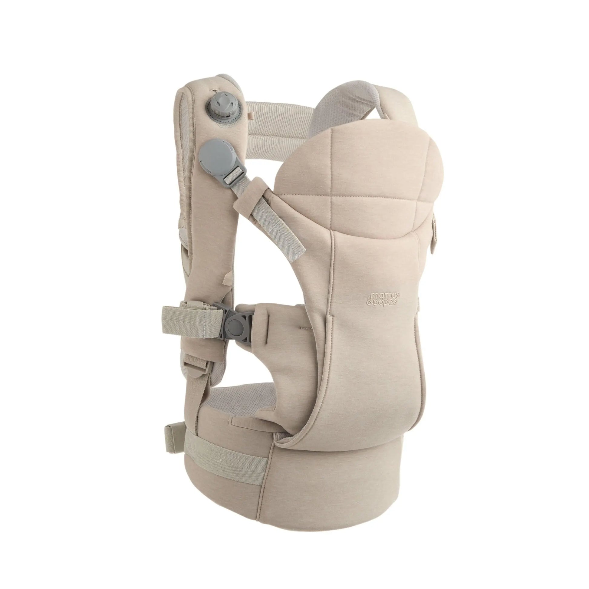 Kudo Baby Carrier Cashmere by Mamas & Papas — parent carrying baby in warm neutral cashmere colourway