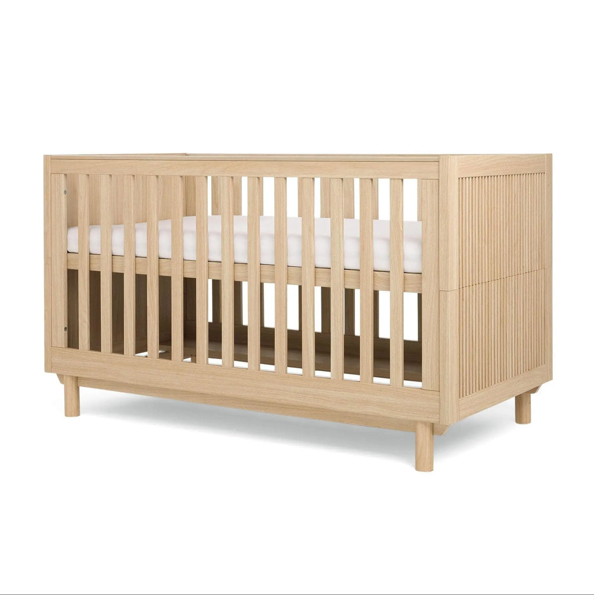 Oska Cotbed oak in a modern nursery with natural textures