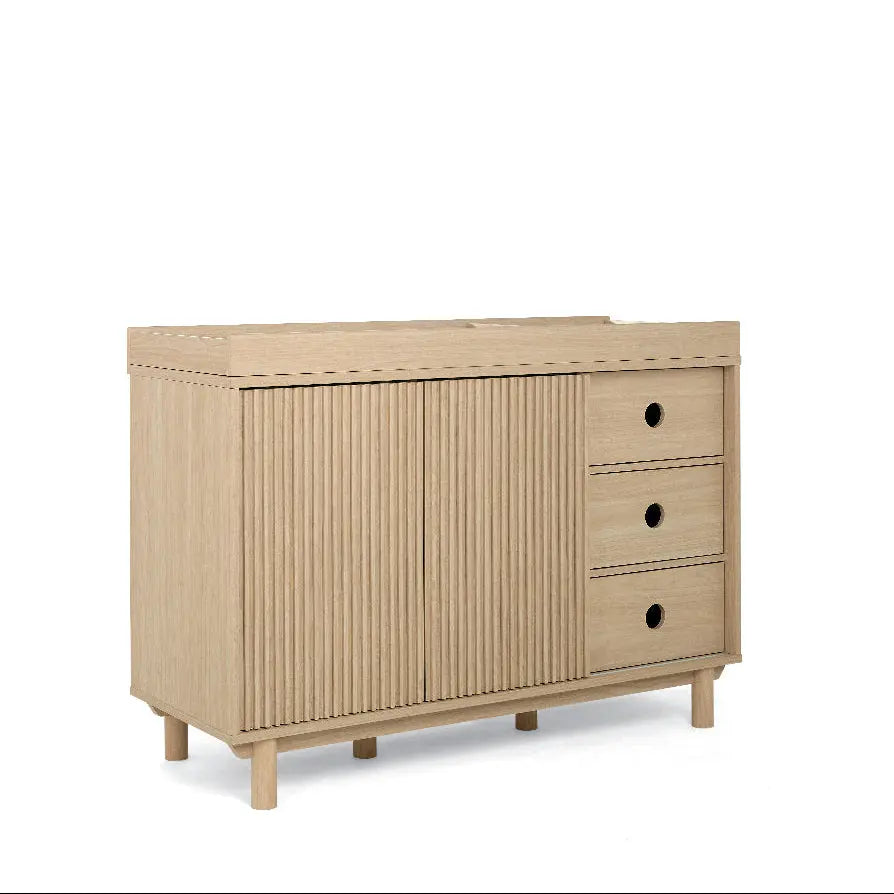 Oska wide dresser changer oak front view with sliding doors closed