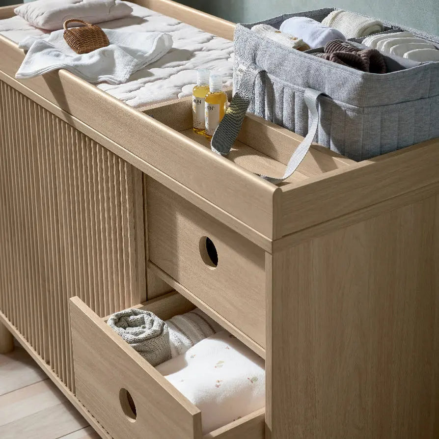 Oska wide dresser changer oak detail of sliding door handle