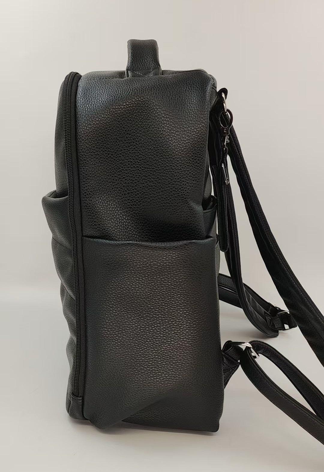 Coco Mae Sienna nappy backpack side view, Black