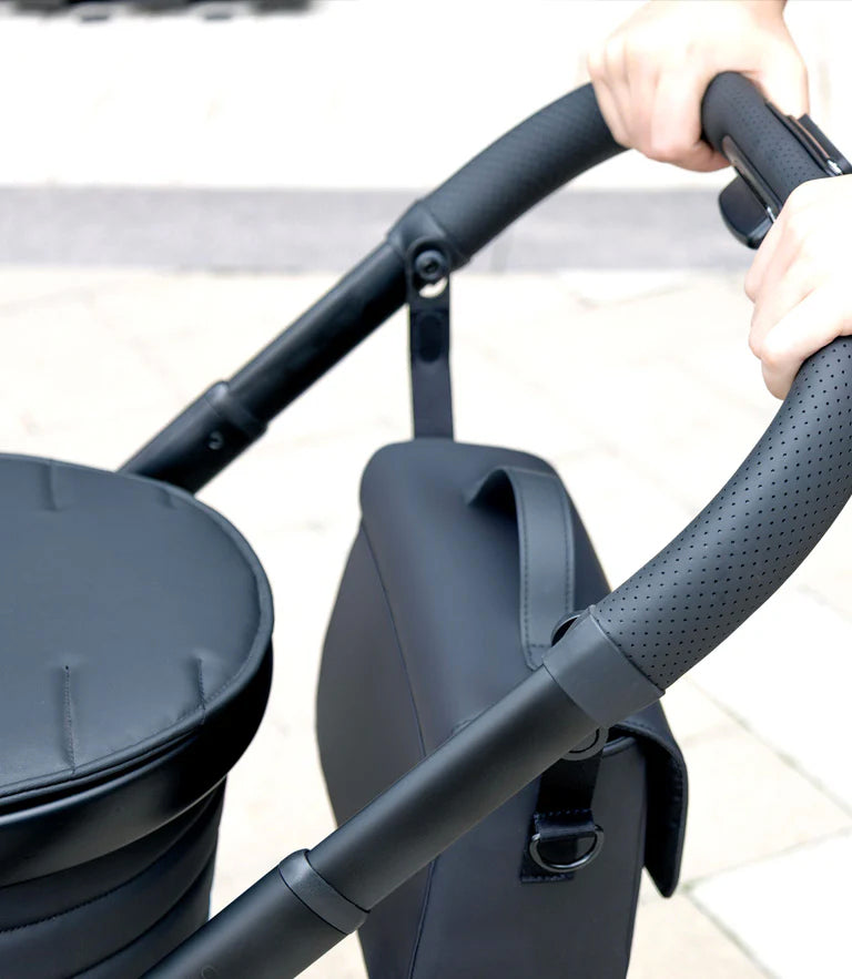 iCandy Organiser Bag carried crossbody as a changing bag