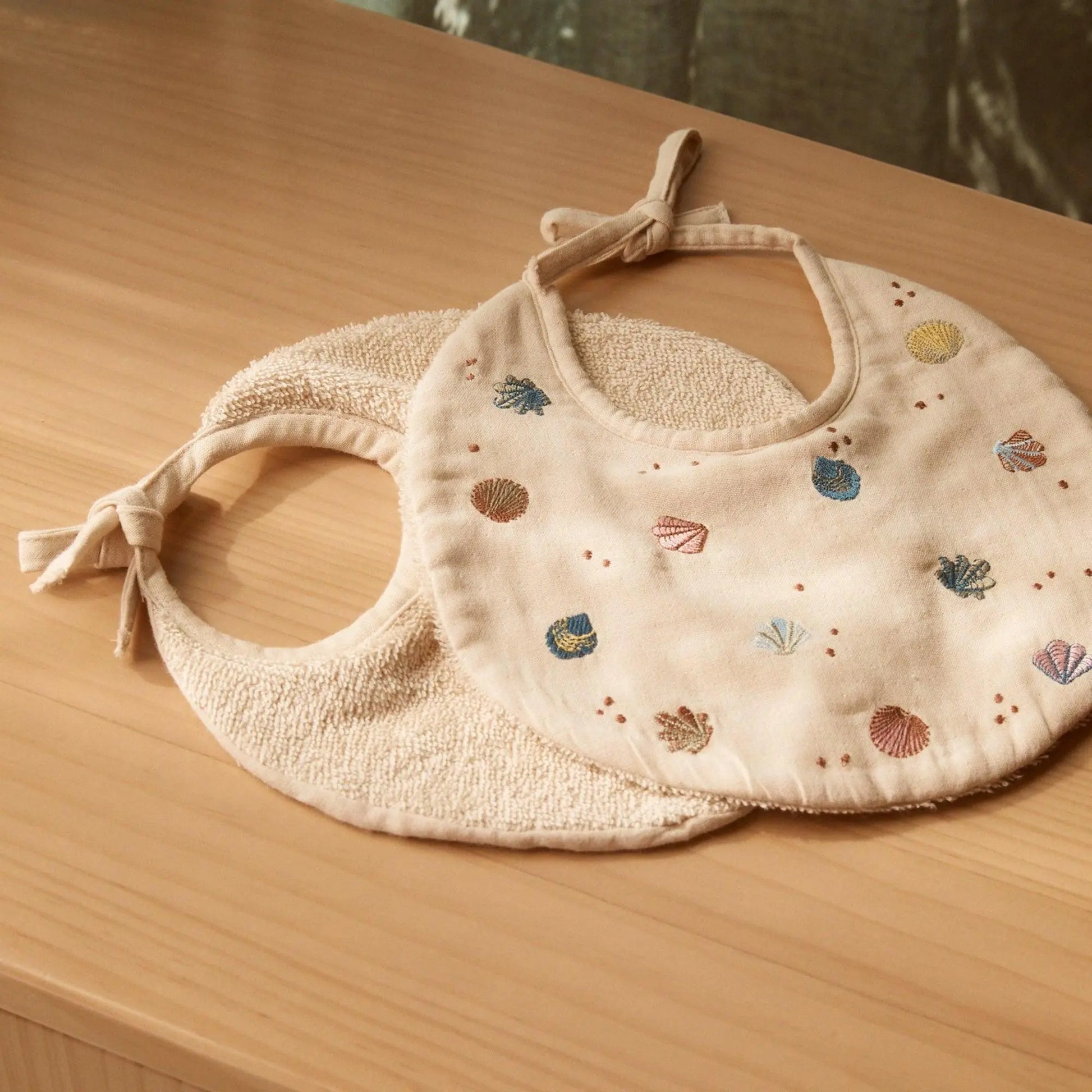 Phile Embroidered Bib