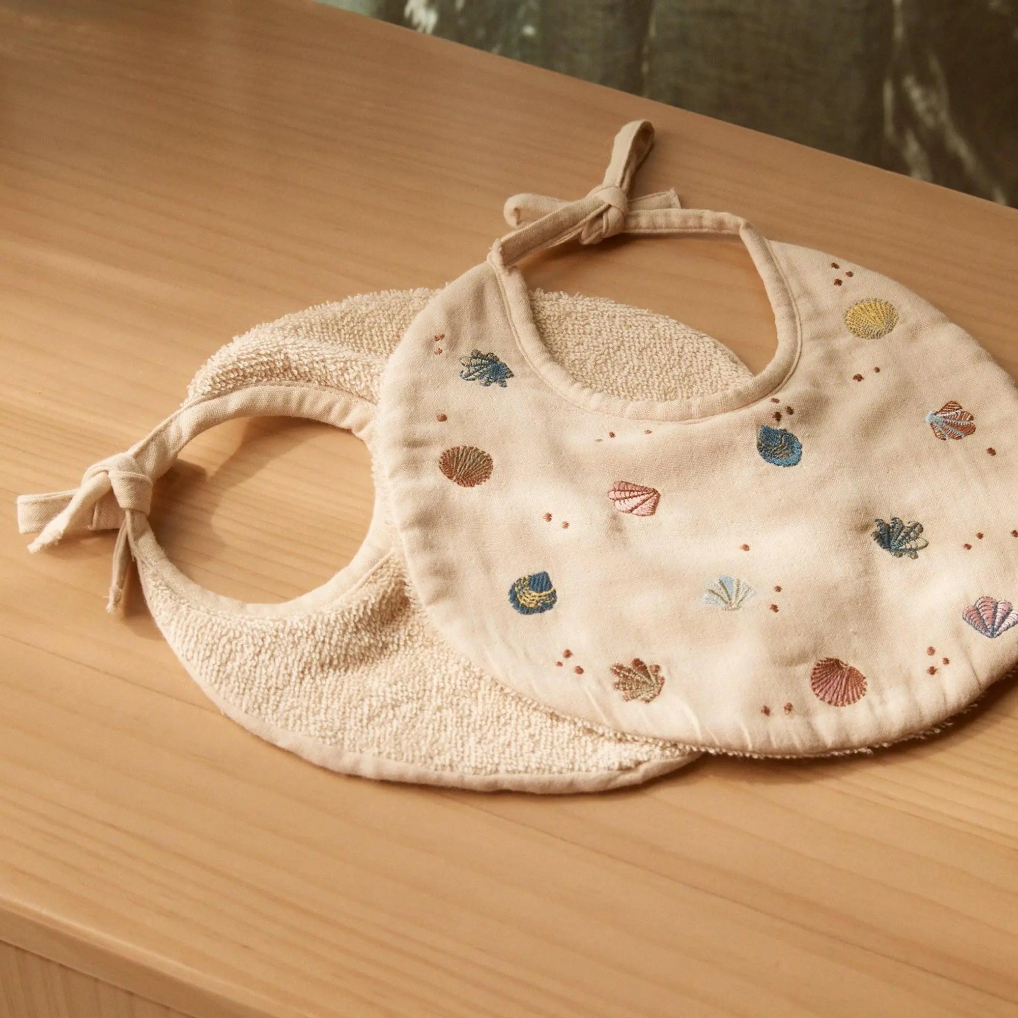 Phile Embroidered Bib