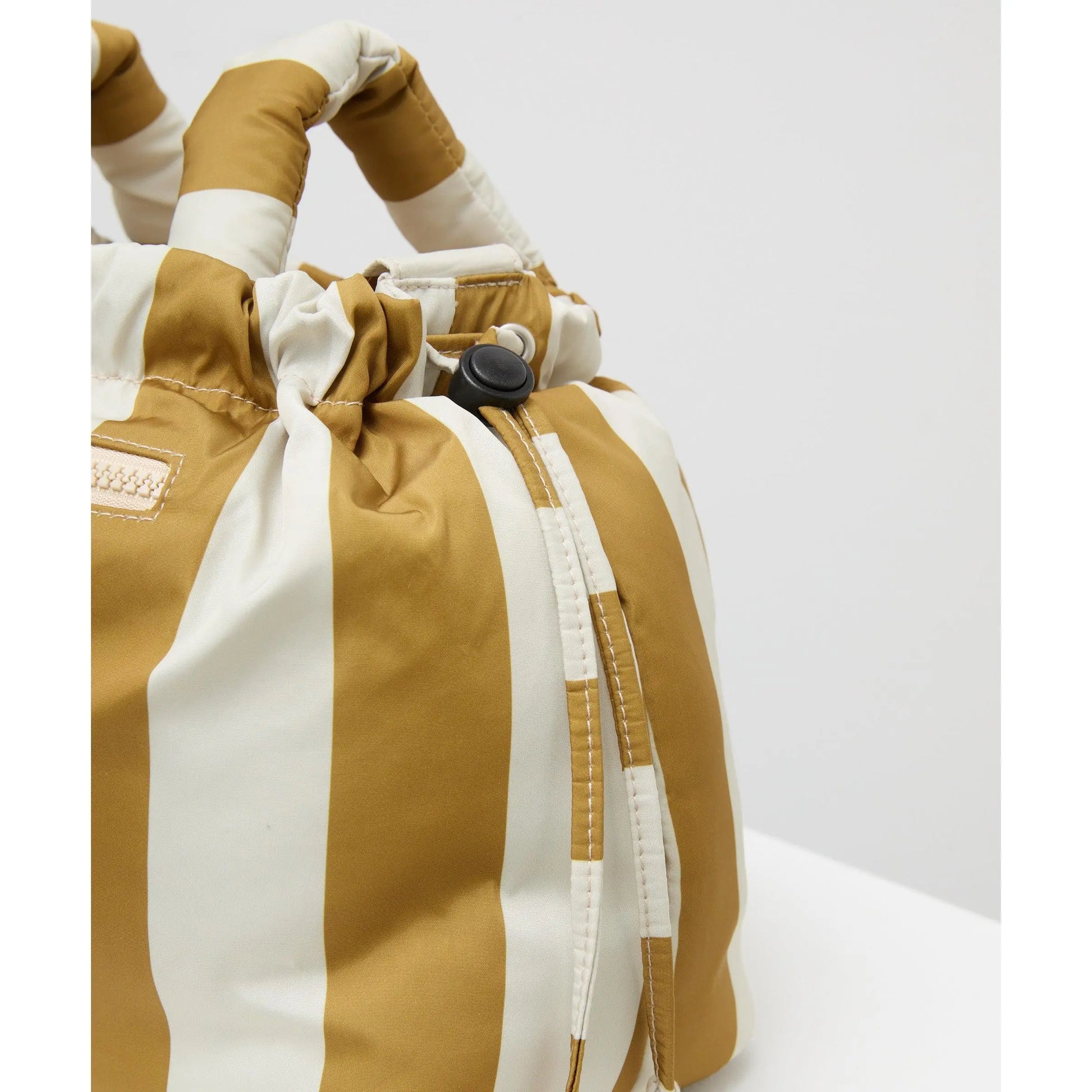 Philé Pram Caddy in Gold Stripe, thermal bottle holder