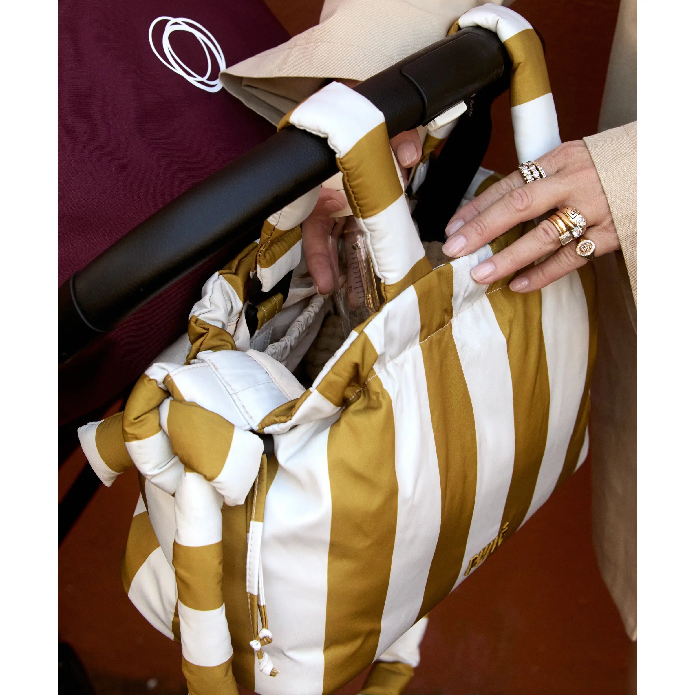 Philé Pram Caddy in Gold Stripe, full product flat lay