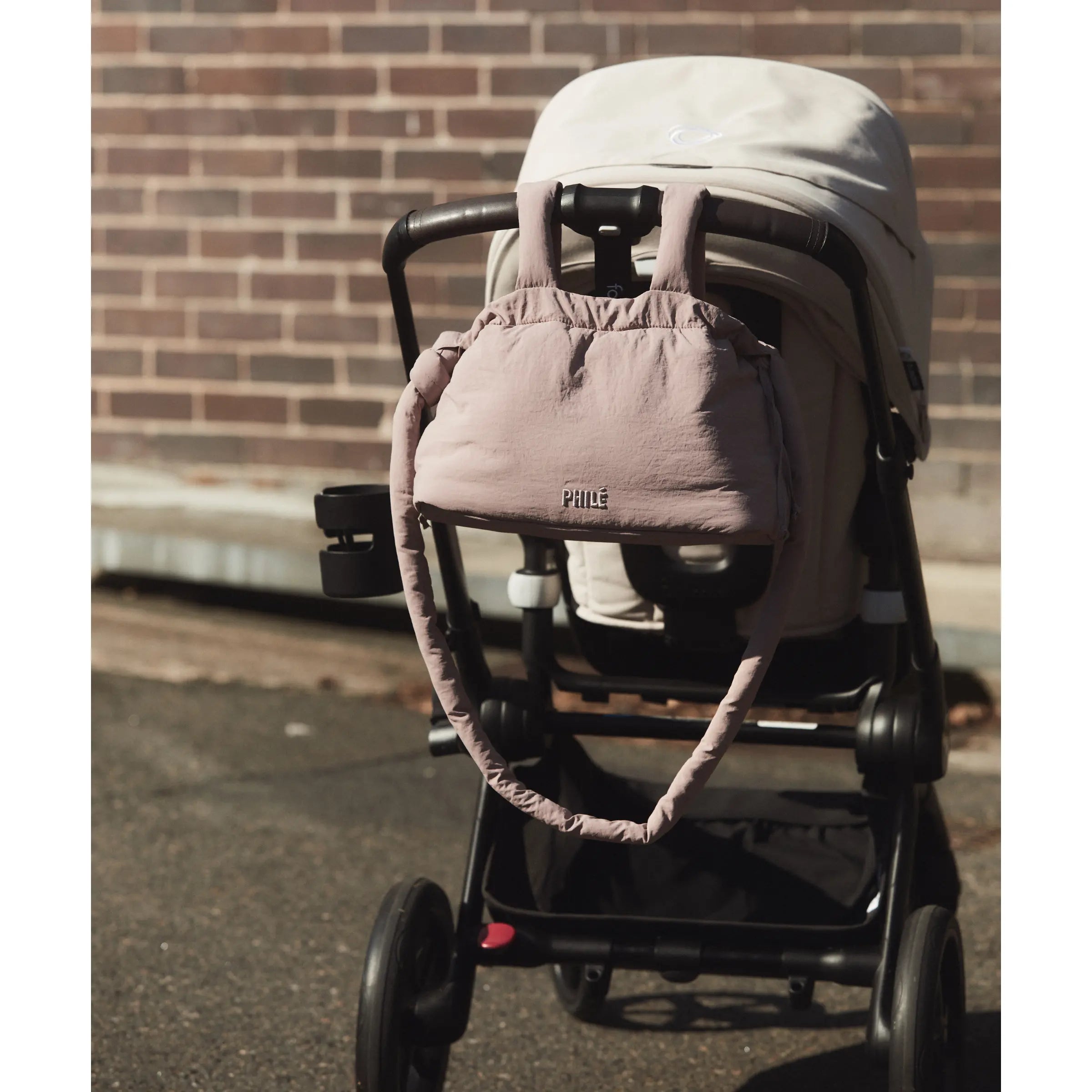Philé Pram Caddy in Dusty Rose, full product flat lay