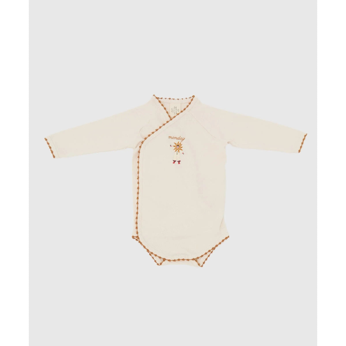 Baby wearing a Phile Welcome to the Circus long-sleeve organic cotton bodysuit