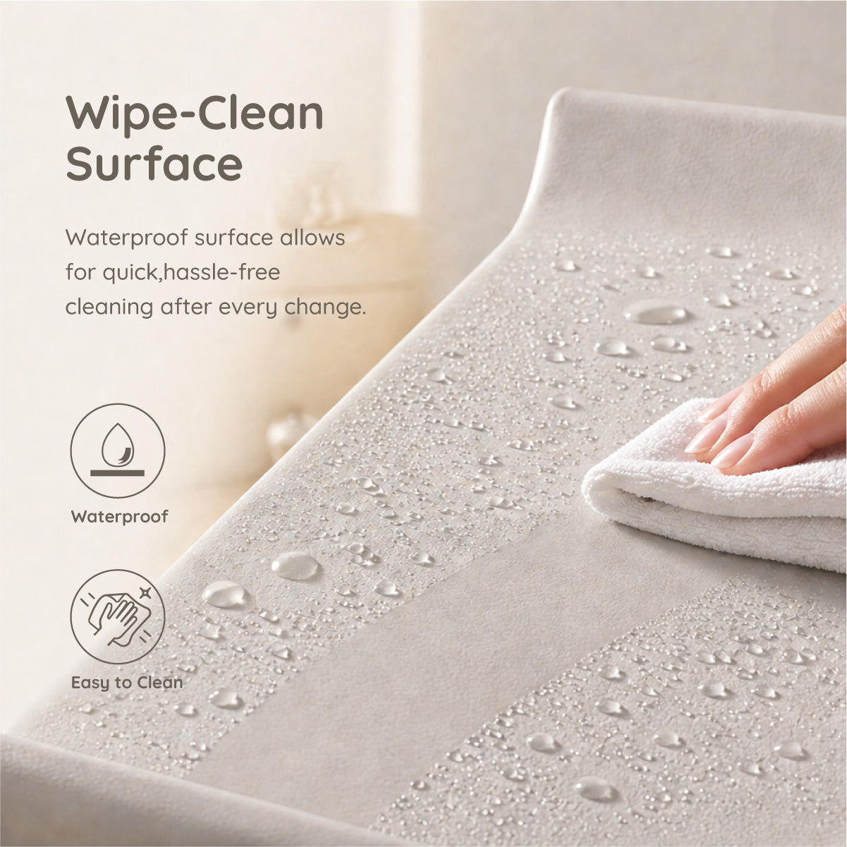 Close-up of Boori Soft Lux Change Pad waterproof PU leather surface in grey
