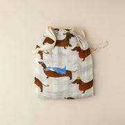 SNUG AS A BUB + CO Silly Sausage Bassinet Sheet