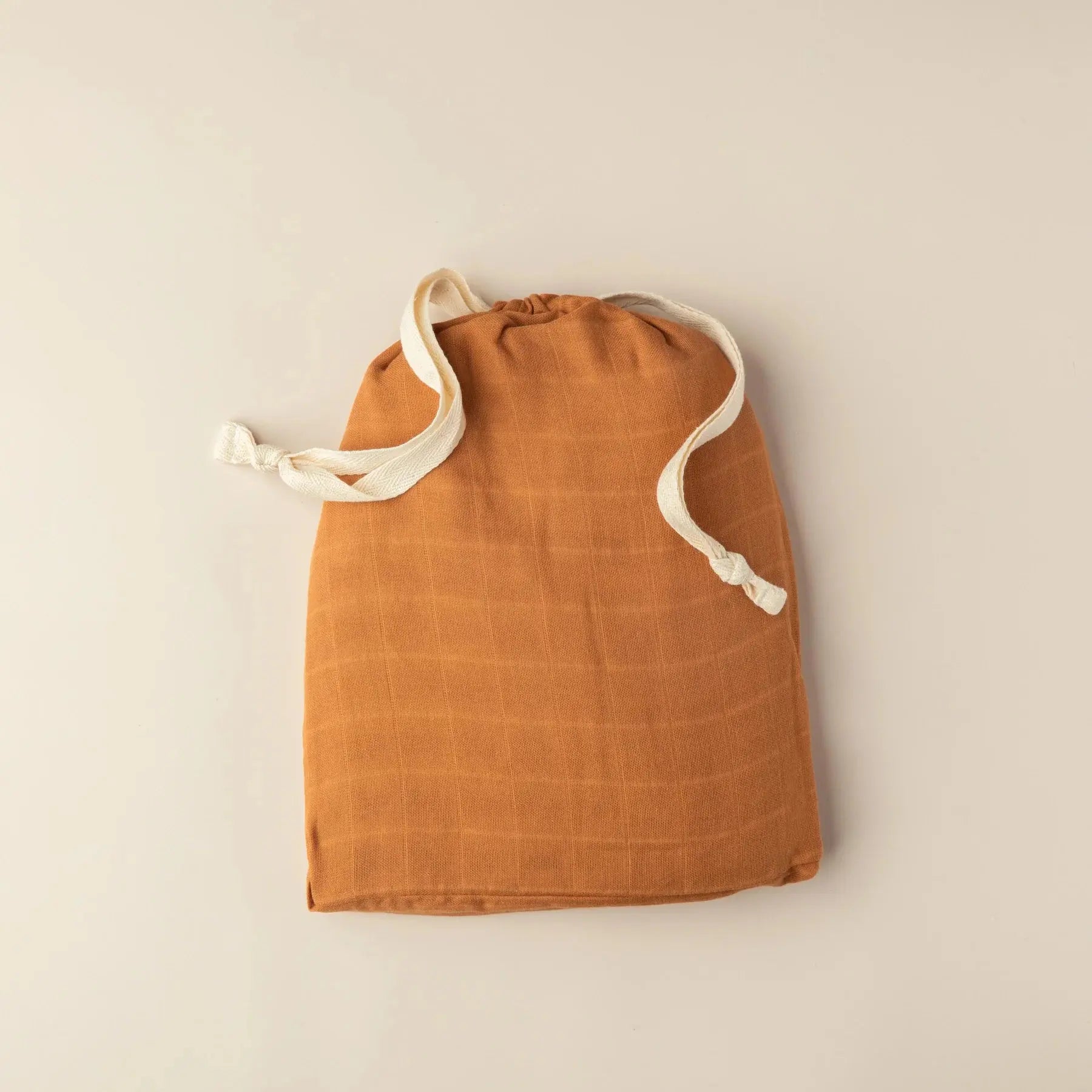 SNUG AS A BUB + CO Terracotta Cot Sheet