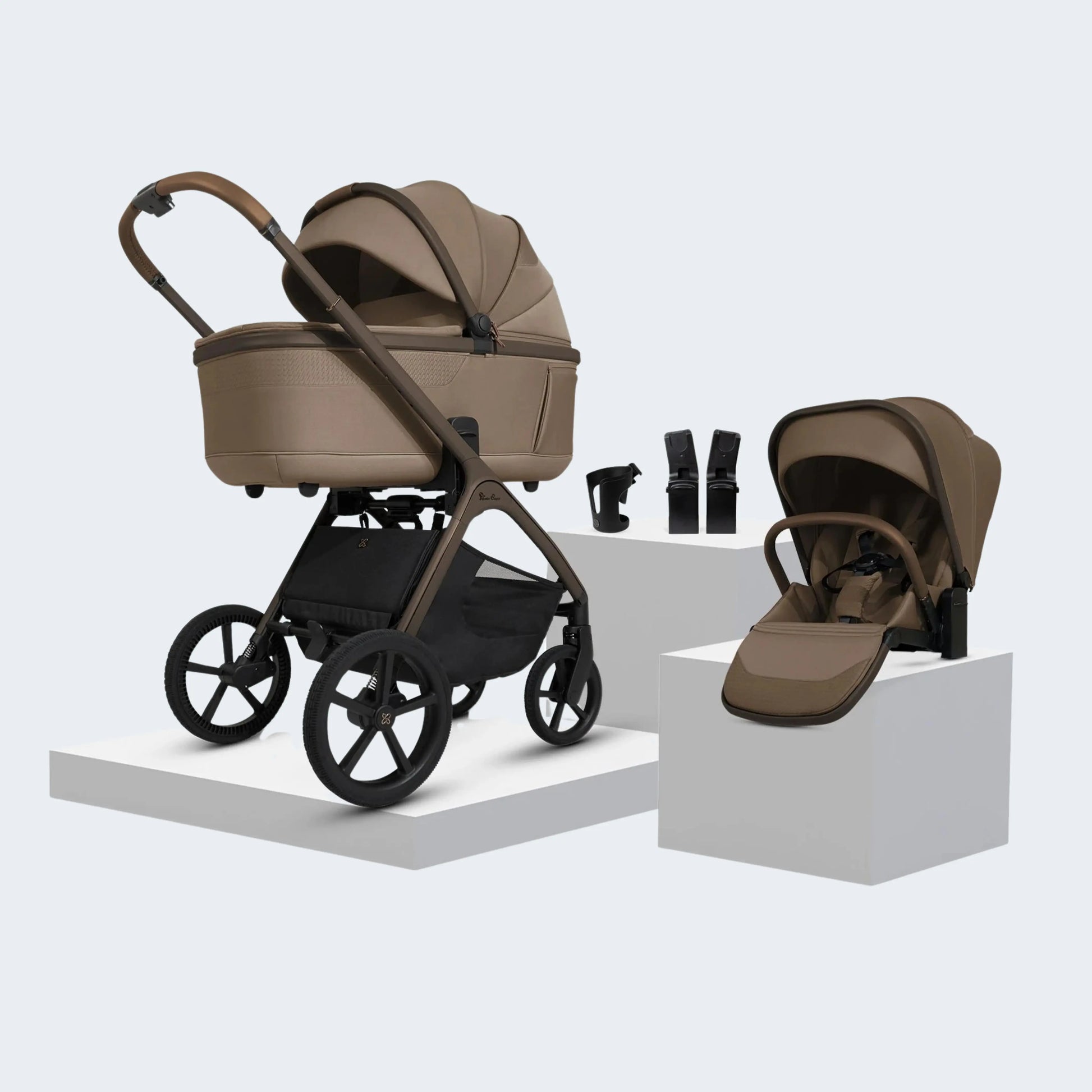 Silver Cross Cove 2 pram lifestyle shot — family on coastal walk with Cove 2
