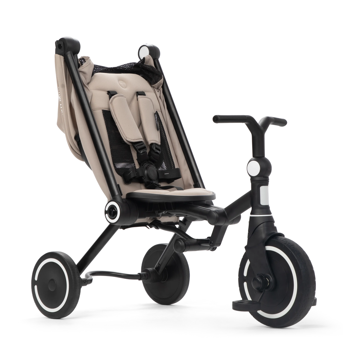 Toddler riding the smarTrike Wonder Max Stone Beige independently in free riding mode