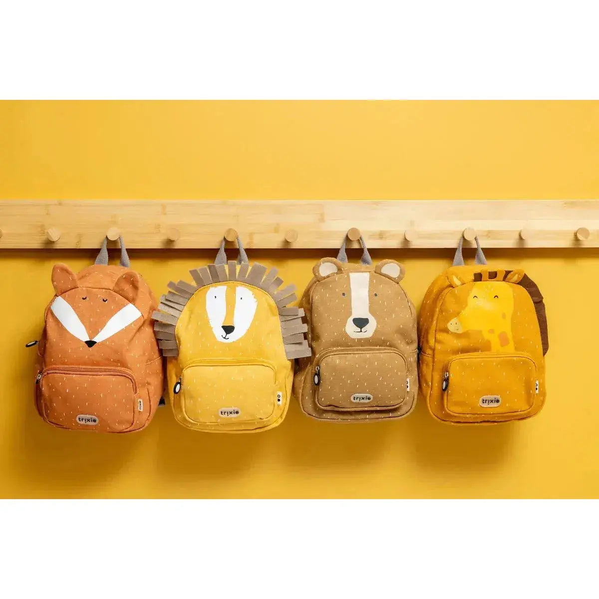 Child wearing Trixie Mr. Giraffe backpack – eco-friendly kids daycare bag