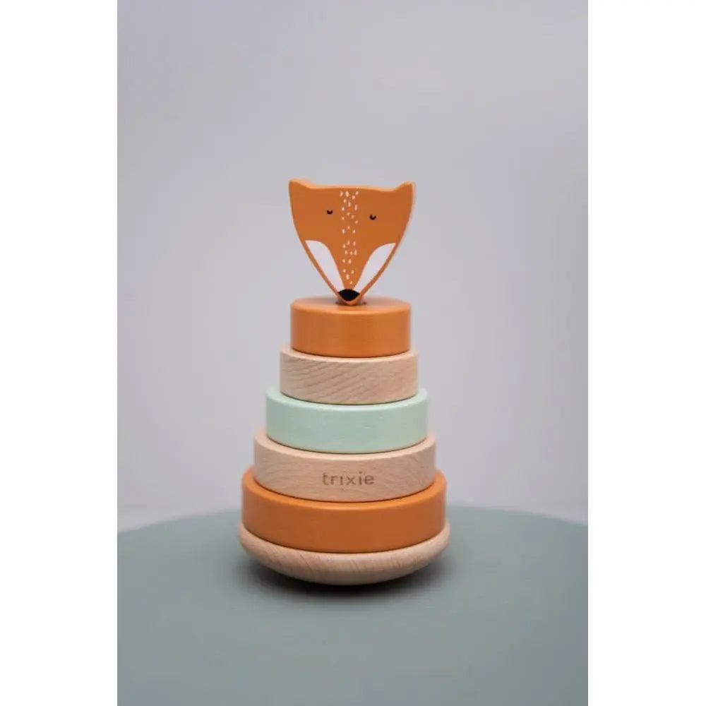 Side view of Trixie Mr. Fox wooden ring stacker showing curved wobble base