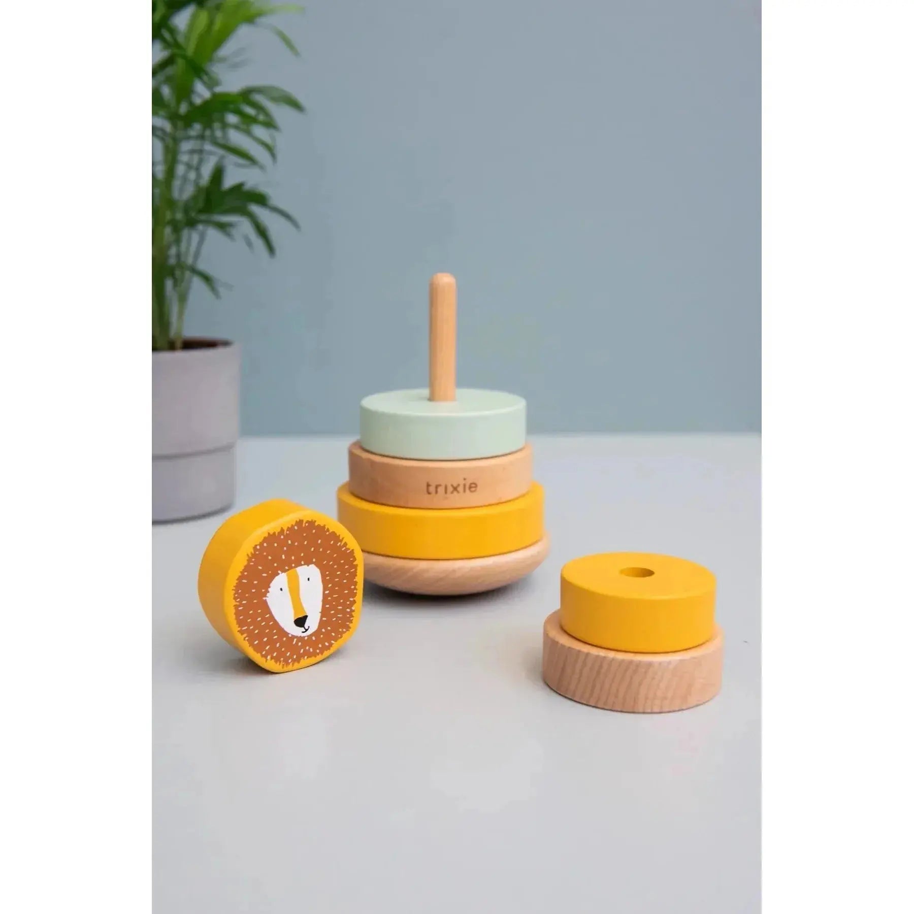 Toddler stacking rings on Trixie Mr. Lion wooden wobble stacker – fine motor toy