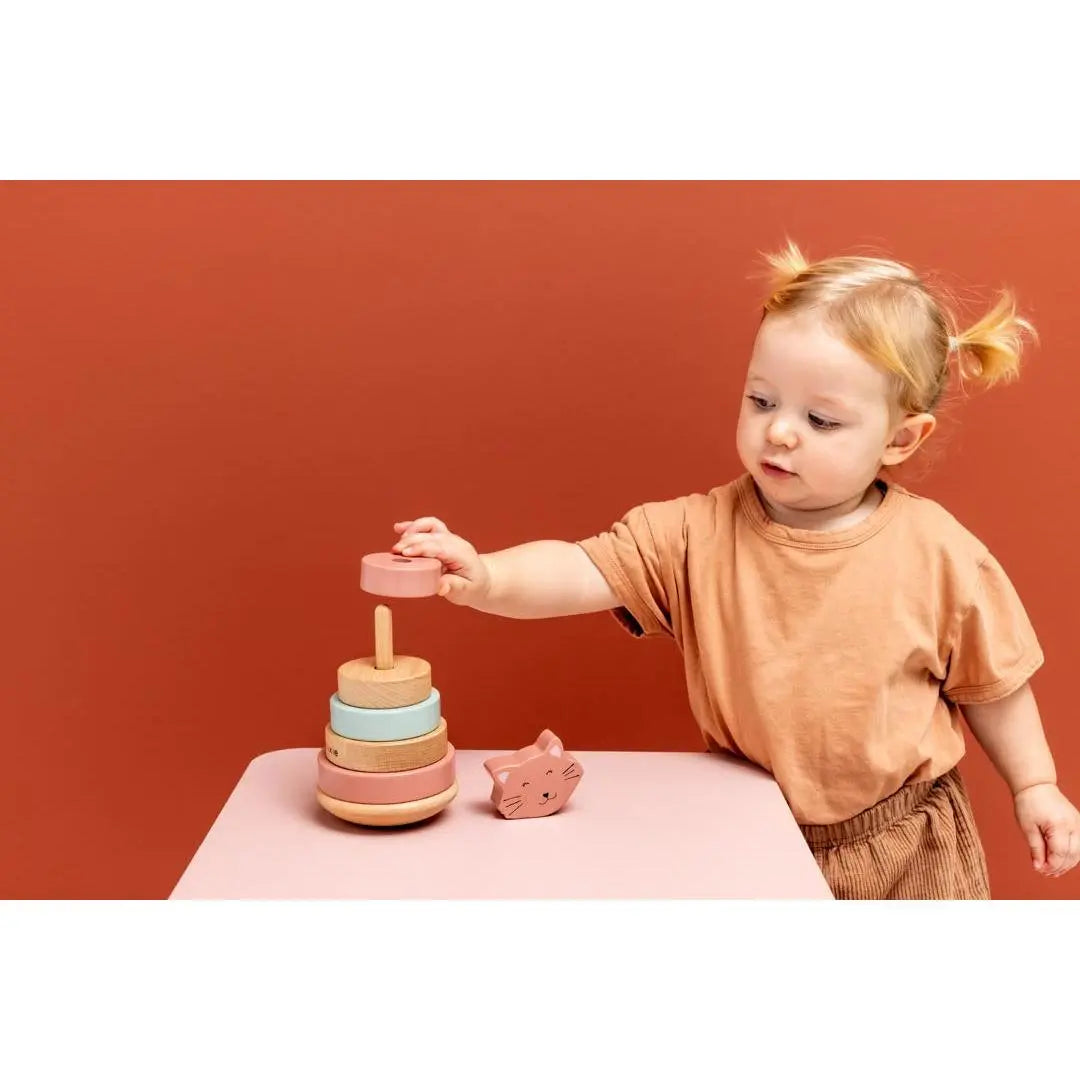 Side view of Trixie Mrs. Cat wooden ring stacker showing curved wobble base