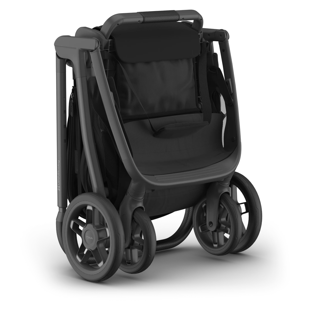 UPPAbaby Kona folded with the seat attached, standing on its own