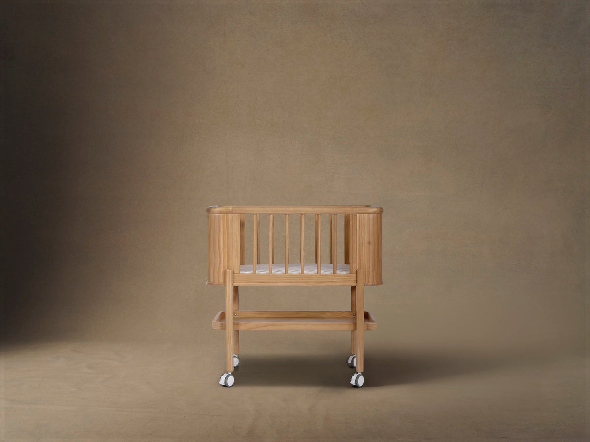 Seena Willow bassinet styled in a room