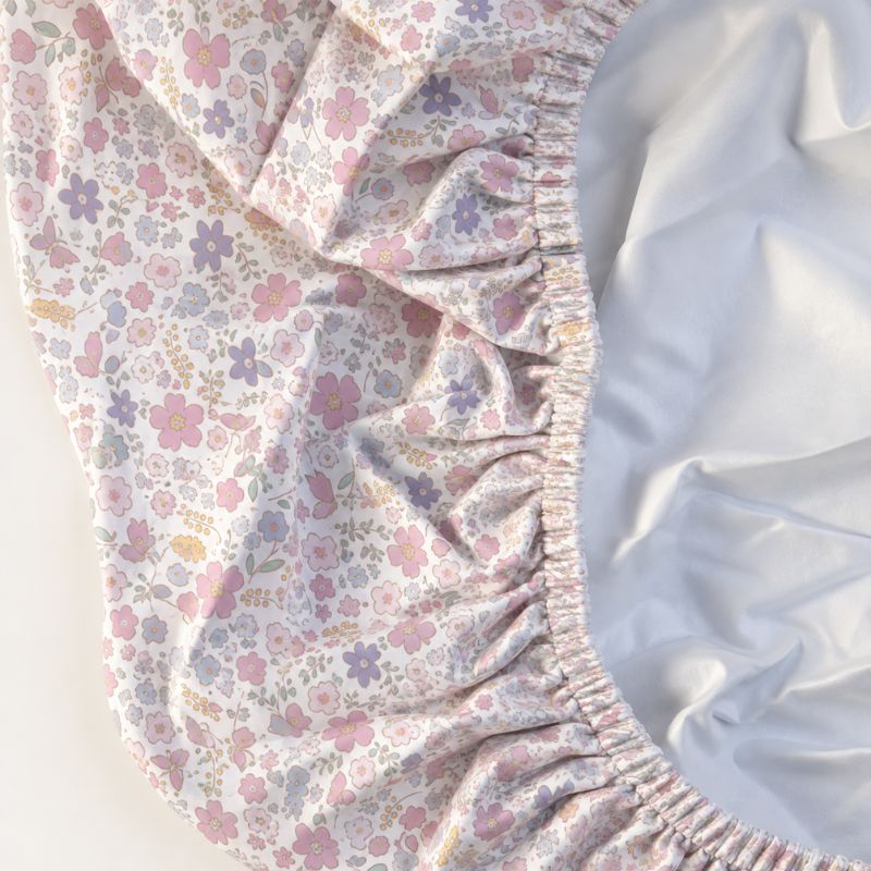 Blossom cot sheet hidden waterproof layer