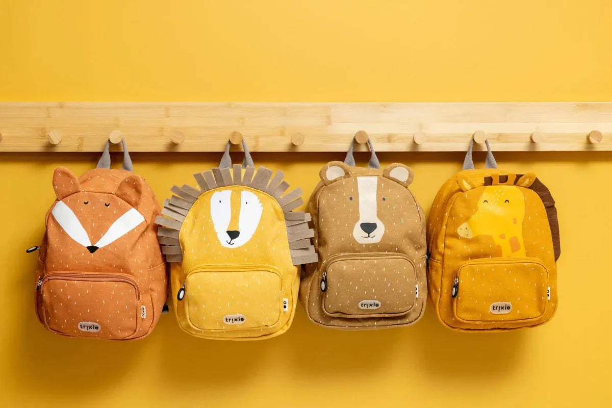Child wearing Trixie Mr. Giraffe backpack – eco-friendly kids daycare bag